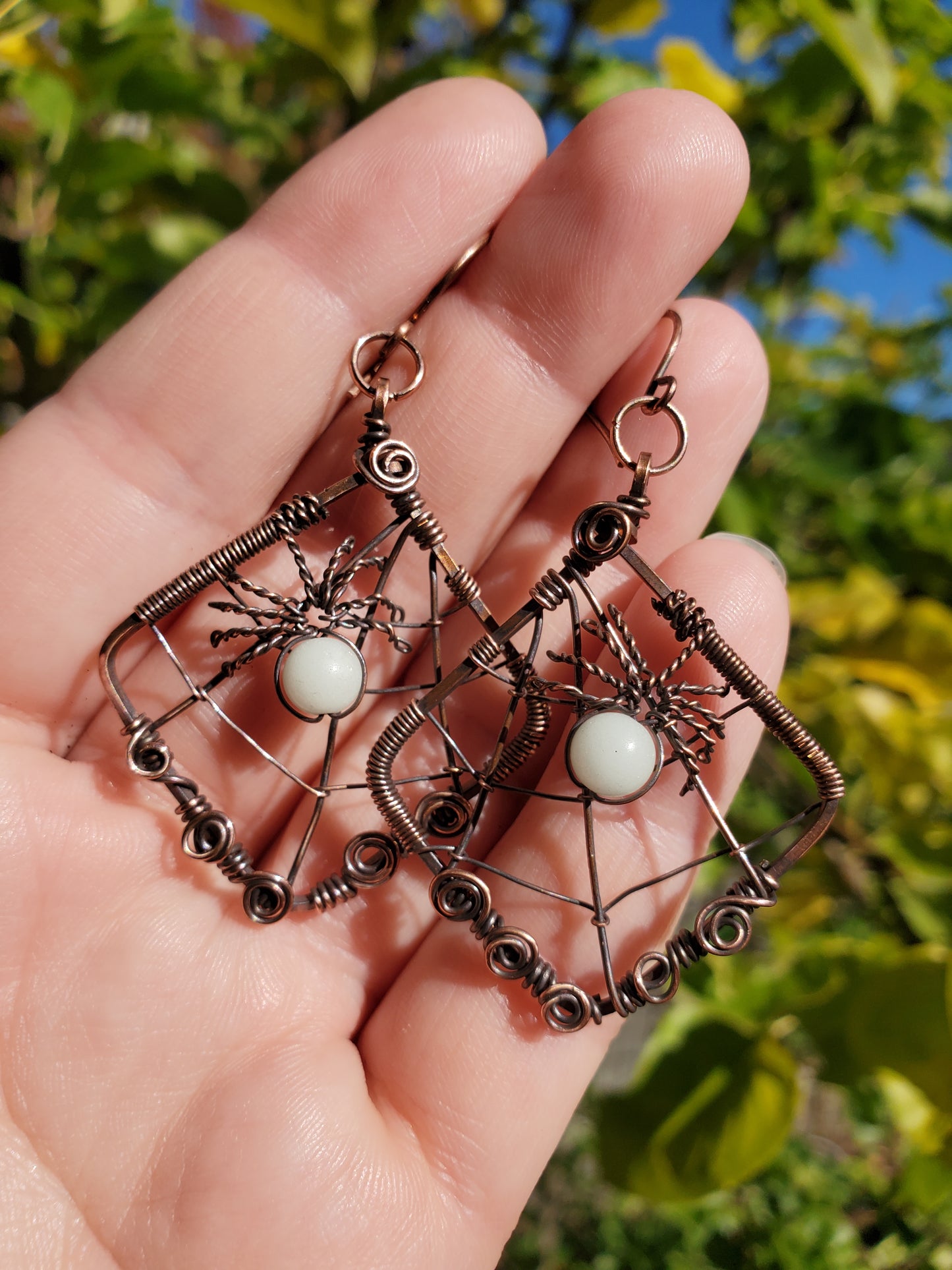 Glow-in-the-dark Spiderweb Earrings in Copper