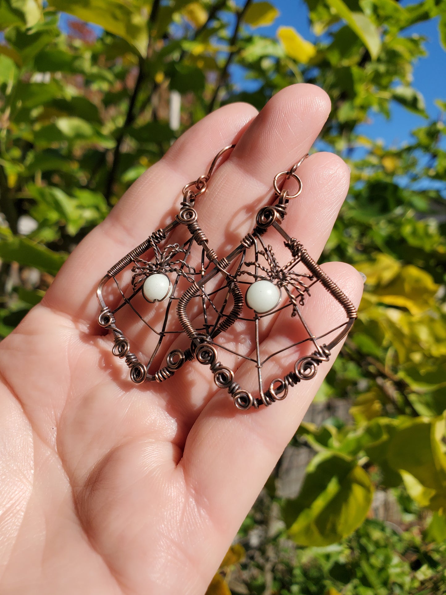 Glow-in-the-dark Spiderweb Earrings in Copper