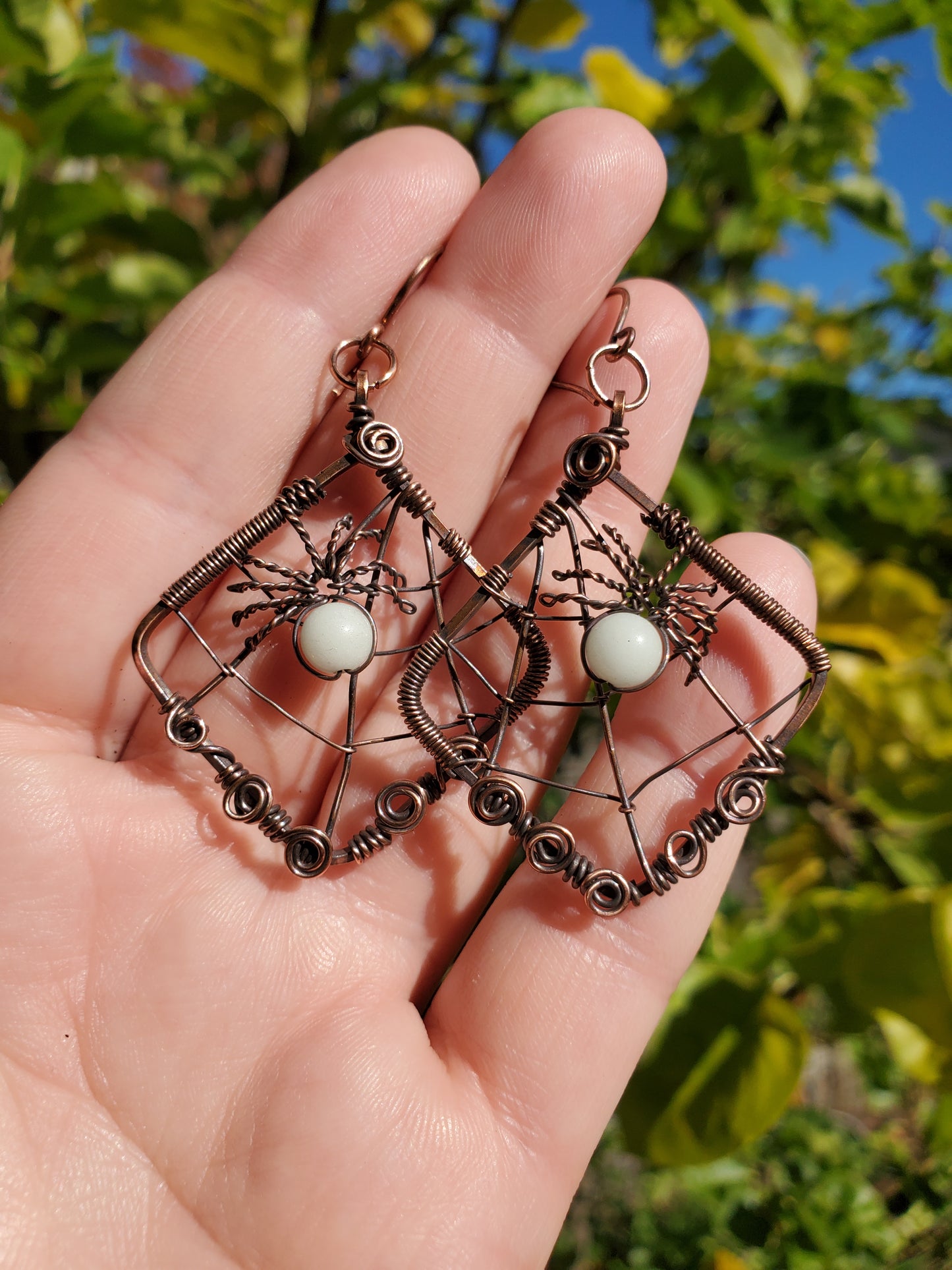 Glow-in-the-dark Spiderweb Earrings in Copper