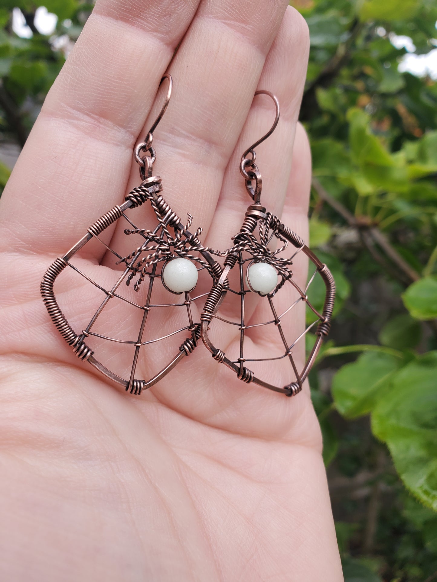 Glow-in-the-dark Spiderweb Earrings in Copper