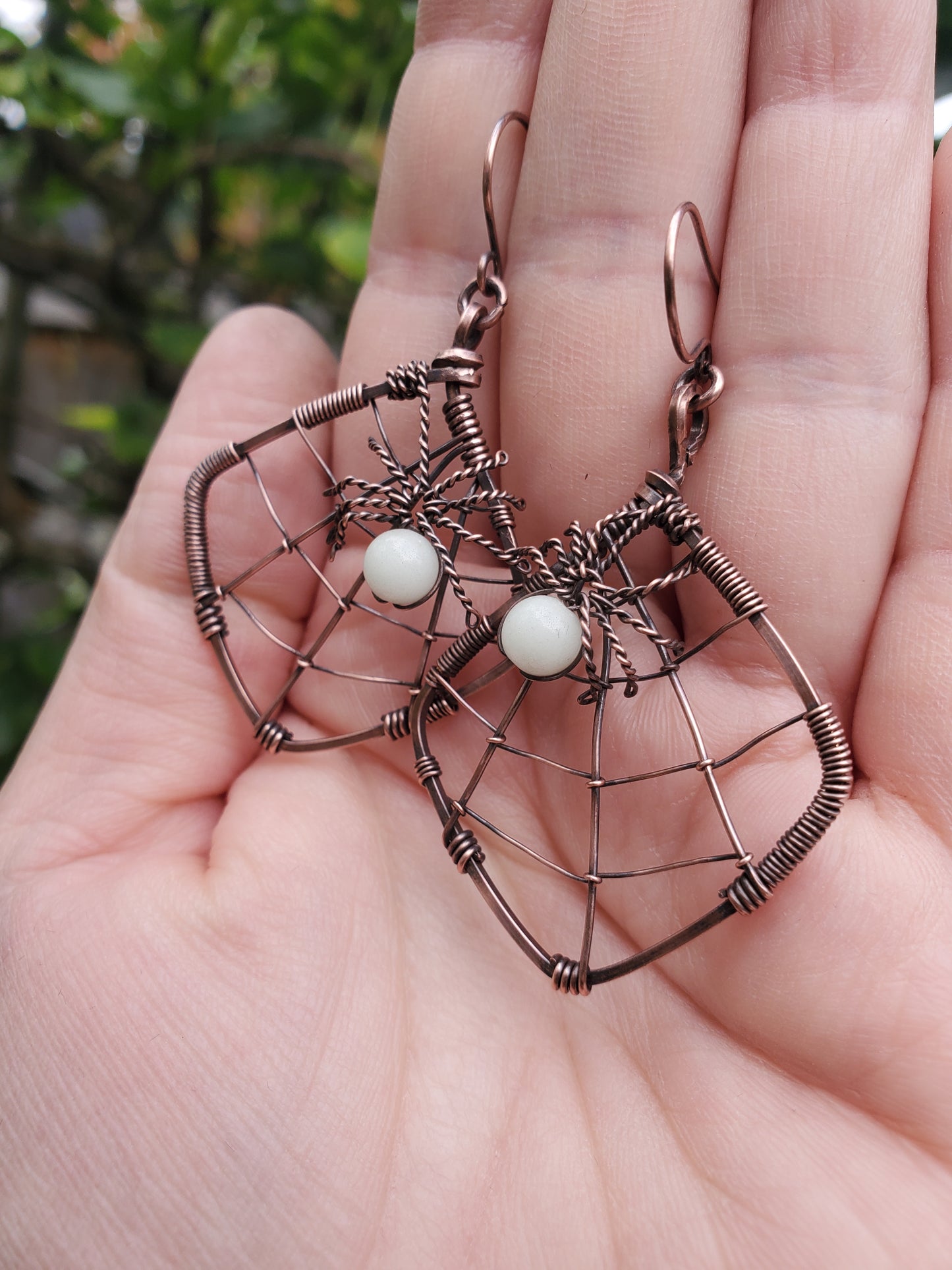 Glow-in-the-dark Spiderweb Earrings in Copper