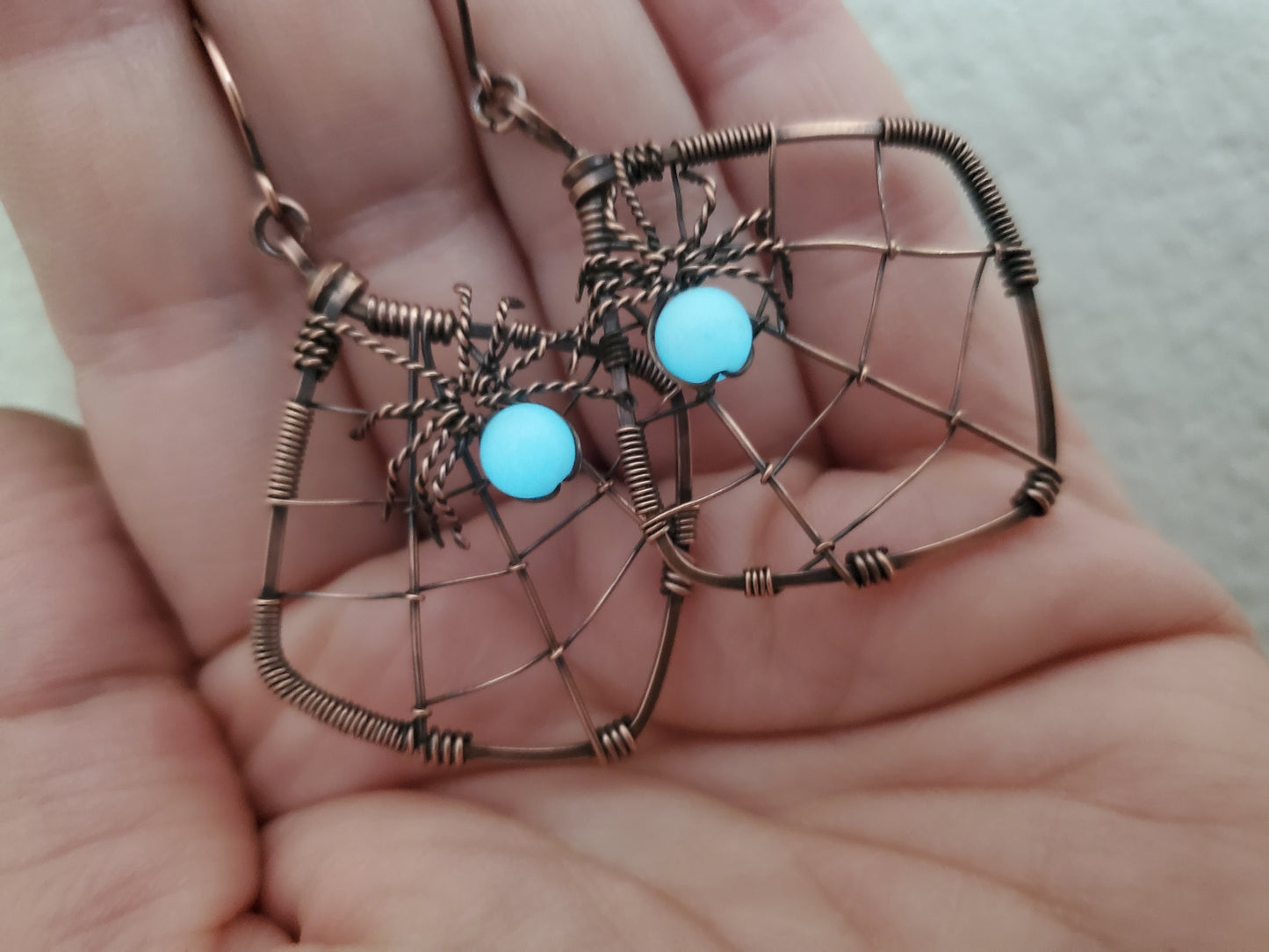 Glow-in-the-dark Spiderweb Earrings in Copper