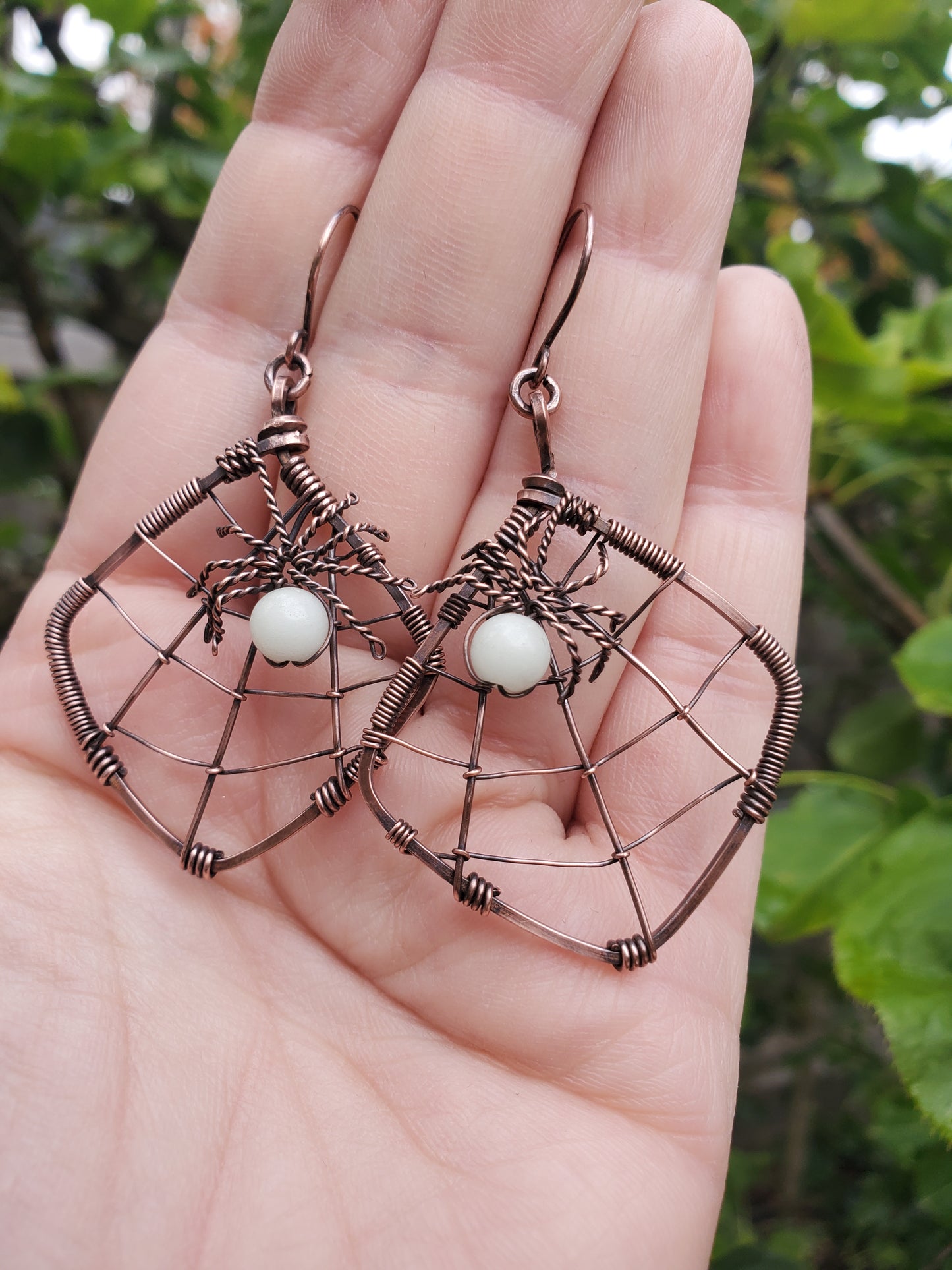 Glow-in-the-dark Spiderweb Earrings in Copper