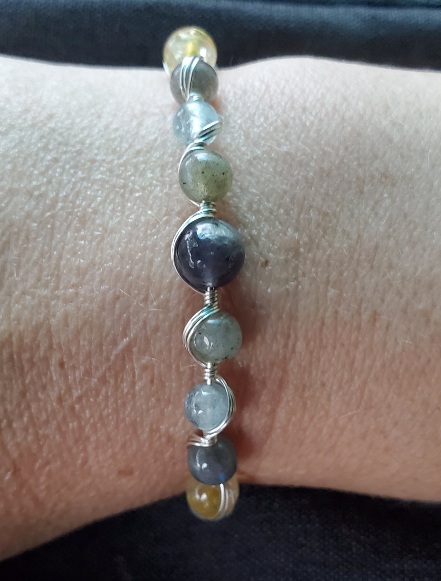 Sterling silver wire wrapped bracelet with tanzanite, aquamarine, citrine, and labradorite